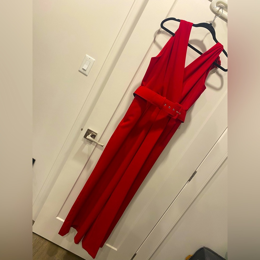 Beautiful red jumpsuit wide leg with a belt